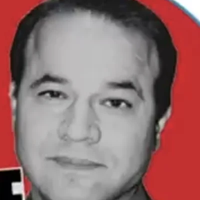 Black-and-white portrait of Mansour Osanloo against a red circle, from a Free Osanloo campaign image.